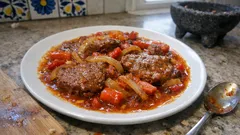 Bisteces a la cacerola en salsa de jitomate: jugosos y listos en 20 minutos