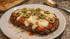 Vacío a la pizza en sartén: jugoso por dentro y con queso gratinado